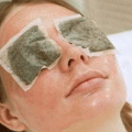 How To Get Rid Of Dark Circles tea bags on a womans eyes
