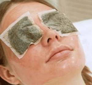 How To Get Rid Of Dark Circles	tea bags on a womans eyes